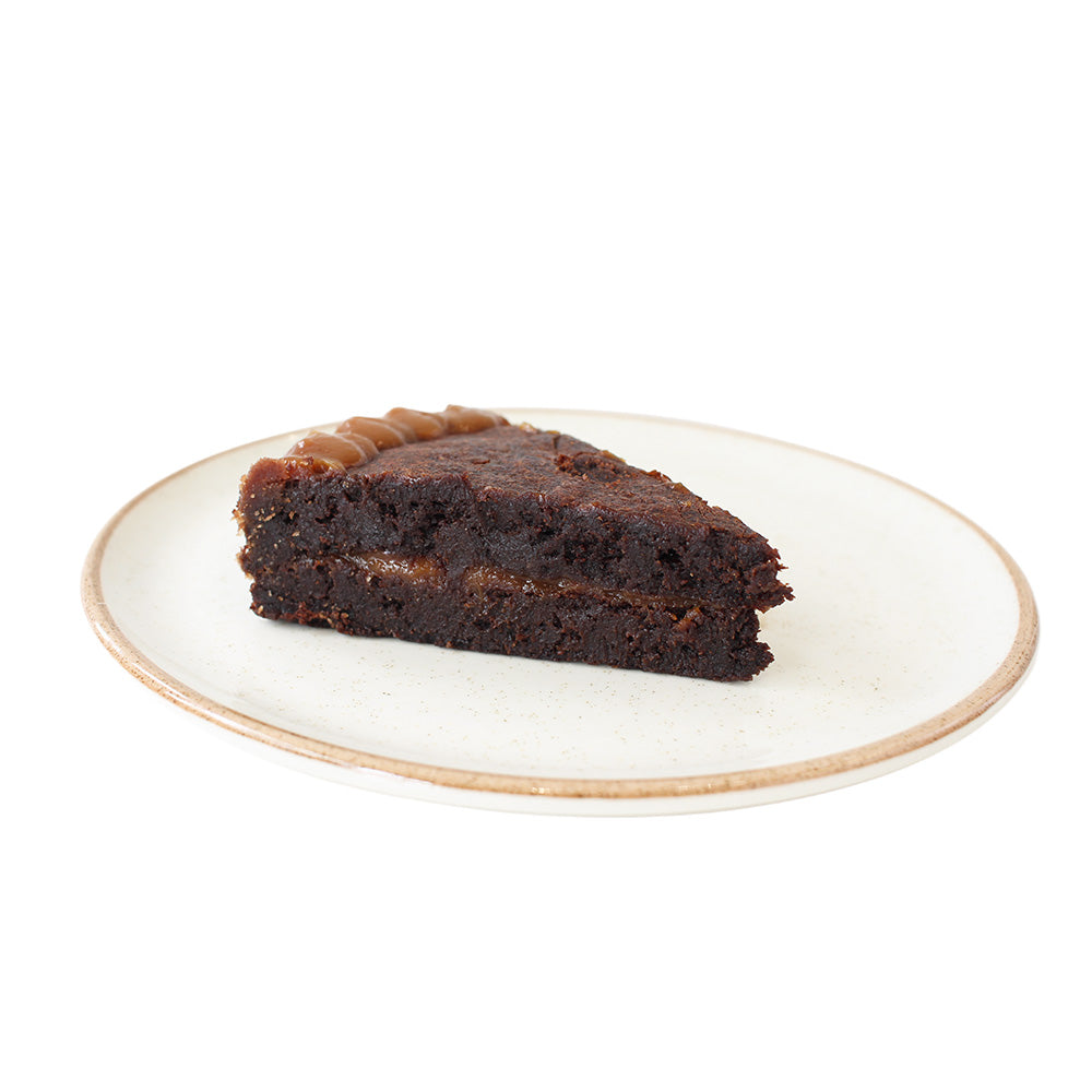Porción torta brownie - Orígenes